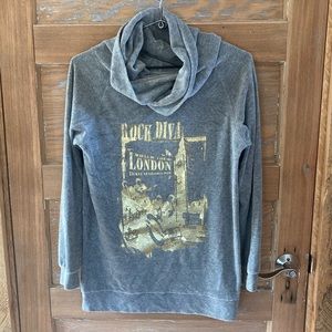suede cowl sweater with gold writing